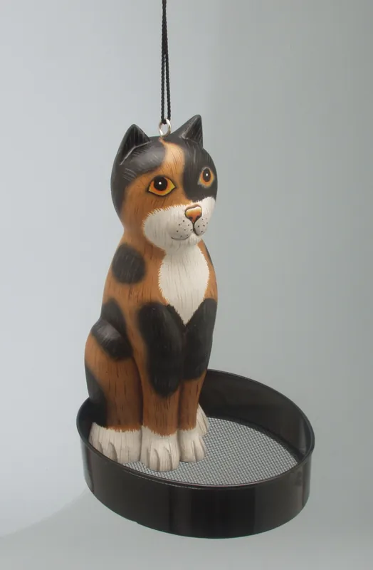 Calico Cat on Iron Ring